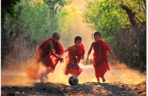 burmese-novices-playing-soccer-in-the-evening